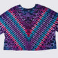 Tie-dye shirt with purple, blue, and red pattern on a white background