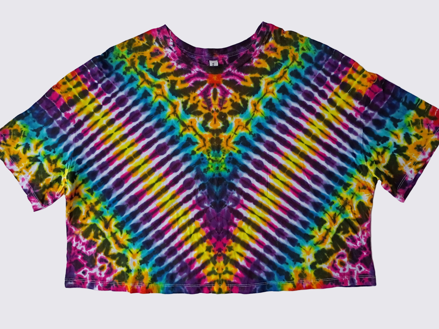 Colorful tie-dye shirt on a white background